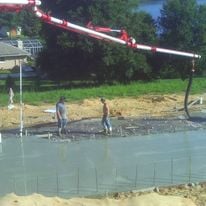 Two People Doing Concrete Work